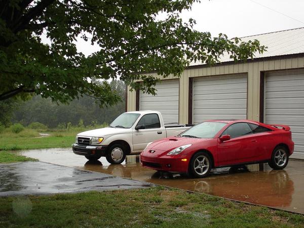 My little truck and celica in front of my shop