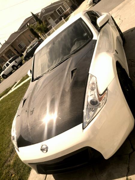 My 370z
r35 Hood CF installed
Black fangs
Glossy black OEM sports wheels
Stillen G3 intakes
Tein Lowering Springs