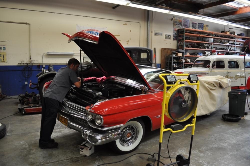 Me working on the 59 caddie , the mistress .