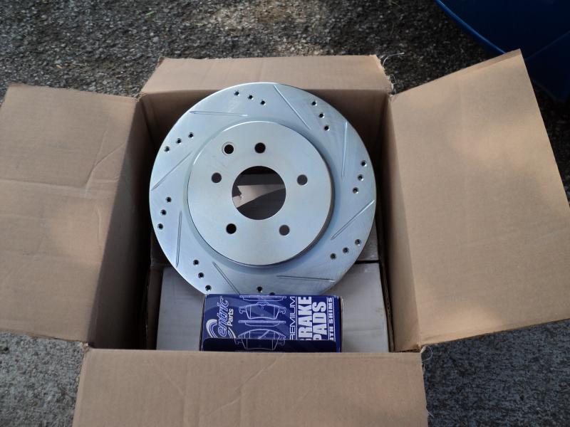 New drilled slotted rotors with ceramic pads.