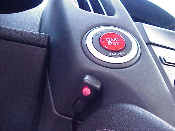 Sprint Booster Button.  This is better than improving throttle response with a tune because the button enables 3 throttle response settings. Each setting makes the button a different color. One of these sets throttle response back to stock.  This is good for valet parking or when allowing someone to drive the Z for the first time.