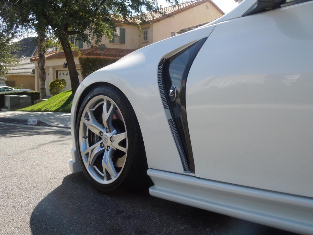 Before painting the vents.  Three coats of black high temp, medium gloss paint.