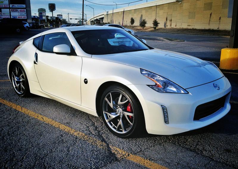 The ubiquitous first shot with my cell phone.  Picked her up in Austin from Maserati of Austin on Wednesday, January 29, 2014.  With 8600 miles and barely a scratch!  Thrilled to be back in a Z car!