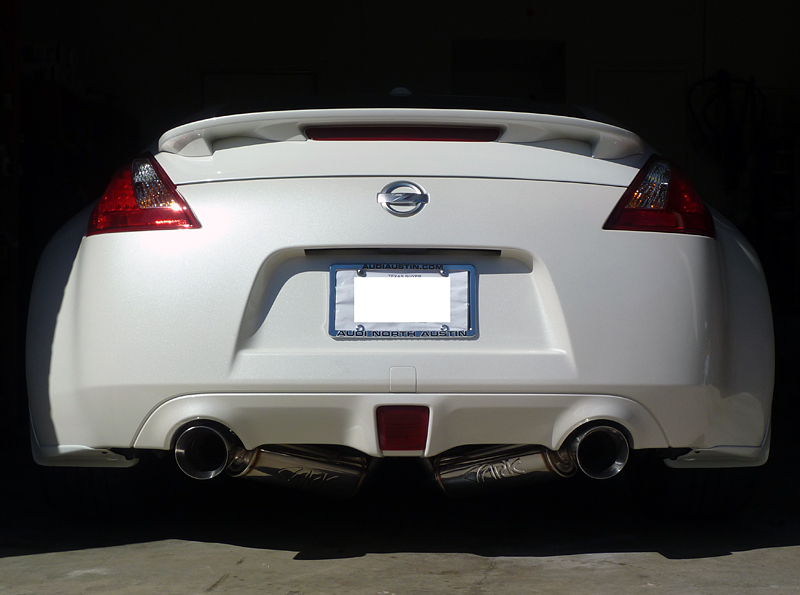 Ark Grip V2 installed!  Couldn't be happier with the look and sound.  Took me three attempts, but finally got the mufflers' angle, ground clearance and tips symmetrical.  Also rebadged the '370Z' emblem.