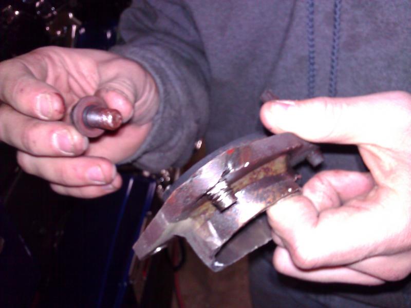 This one thread-less bolt was the source of all problems...we ended up just cutting out the catalytic converters.