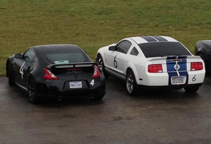 My 370 and my wifes GT500 at Mototsport Ranch in Cresson Tx running with The Drivers Edge