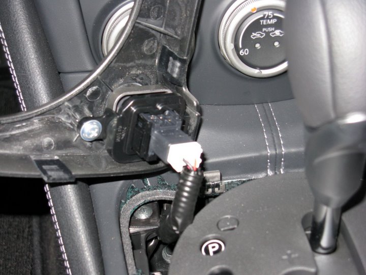 03
Remove the hazard light plug.  Theres a small tab that needs to be pushed in to remove it.