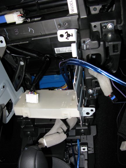 027
Rear Speaker wires coming into the dash behind head unit from center console