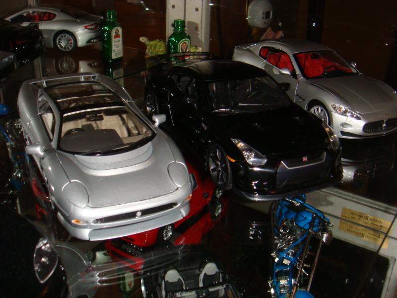 Jaguar XJ220, Nissan GTR, Maseratti Gran Turismo..................little Jager bottle and turtle figurine (don't ask...just a couple memories lol)