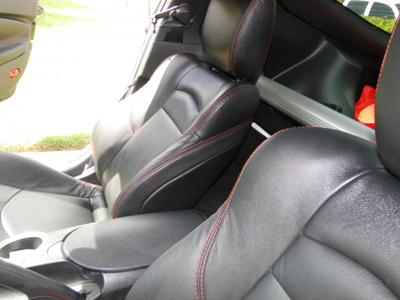 Custom leather interior. I had black leather and red stitching installed in car.