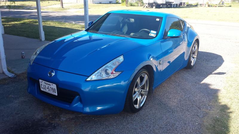 2009 370z touring m6. so far I have a bully dog programmer, magnaflow exhaust and k&n cai.