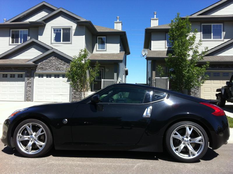 Tinted the windows. The morning before she's going in to get exhaust, intake, and sport springs.