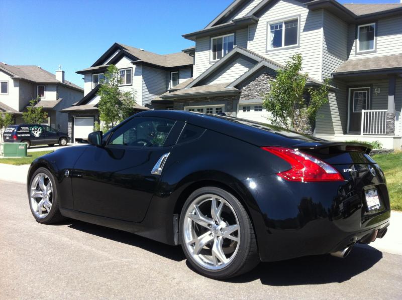 Tinted the windows. The morning before she's going in to get exhaust, intake, spacers, and sport springs.