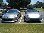 parked next to a 350z with nismo front end bumper on it.