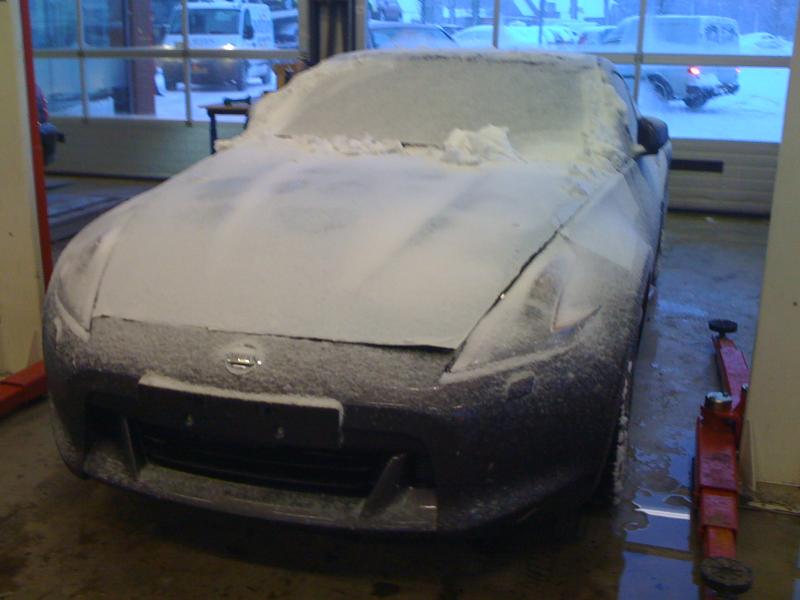 With the snow still on the car, just delivered at the dealer Herwers in Hengelo (Gld).