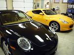 Porsche next to Z in garage. (Z is better) haha