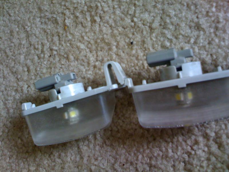 Both LEDs in the license plate light housing