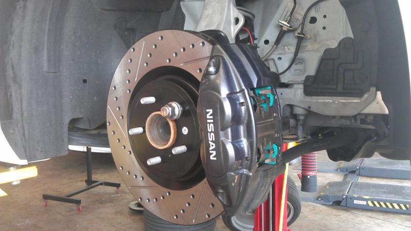 Stop Tech Cross Drilled/Slotted Rotors/Project Mu pads/Stop Tech SS Brake lines. Left F