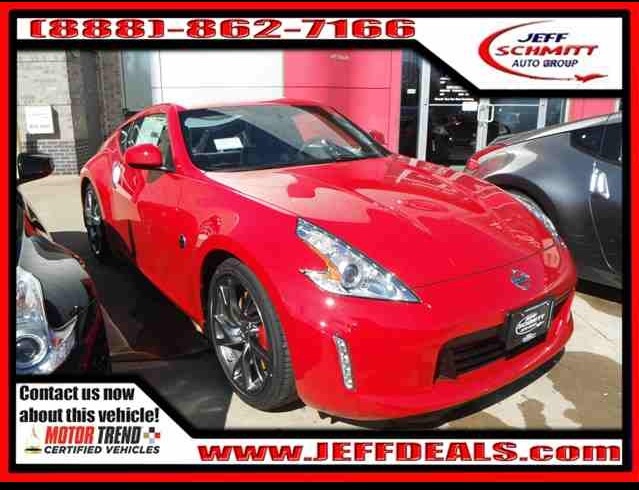 Saw the add, had to have her: 2014 Solid Red Nissan 370Z Coupe Base with Sports Package