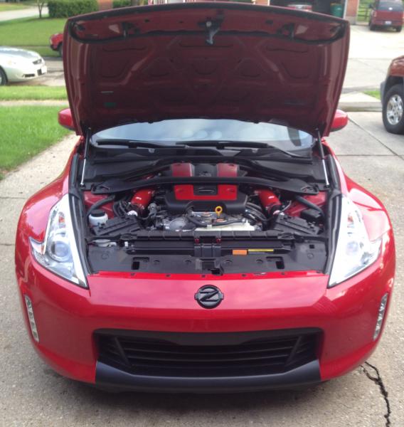 Factory Matched A54 Solid Red Engine Cover & Black Chrome Nissan Badge