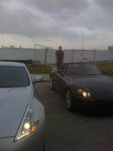 Cloudy day with a fresh wax...next to my neighbor and his S2000, may have to run these two someday