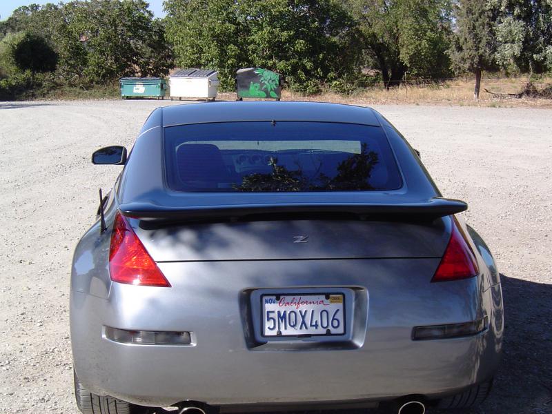 My old 04.5 350Z with G35 Spoiler, Medium window tint, S2000 shorty antenna and reverse lights tinted