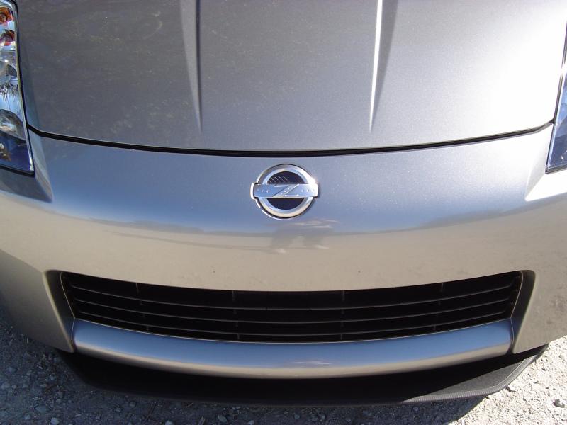 The 04.5 350Z with front splitter. That same splitter now resides on my new 370Z.
Also note - I did the CF badge inserts on this 350Z well. That was carried over to my new car as well.