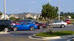 Baby Blue next to a  Black Cherry 350Z conv.