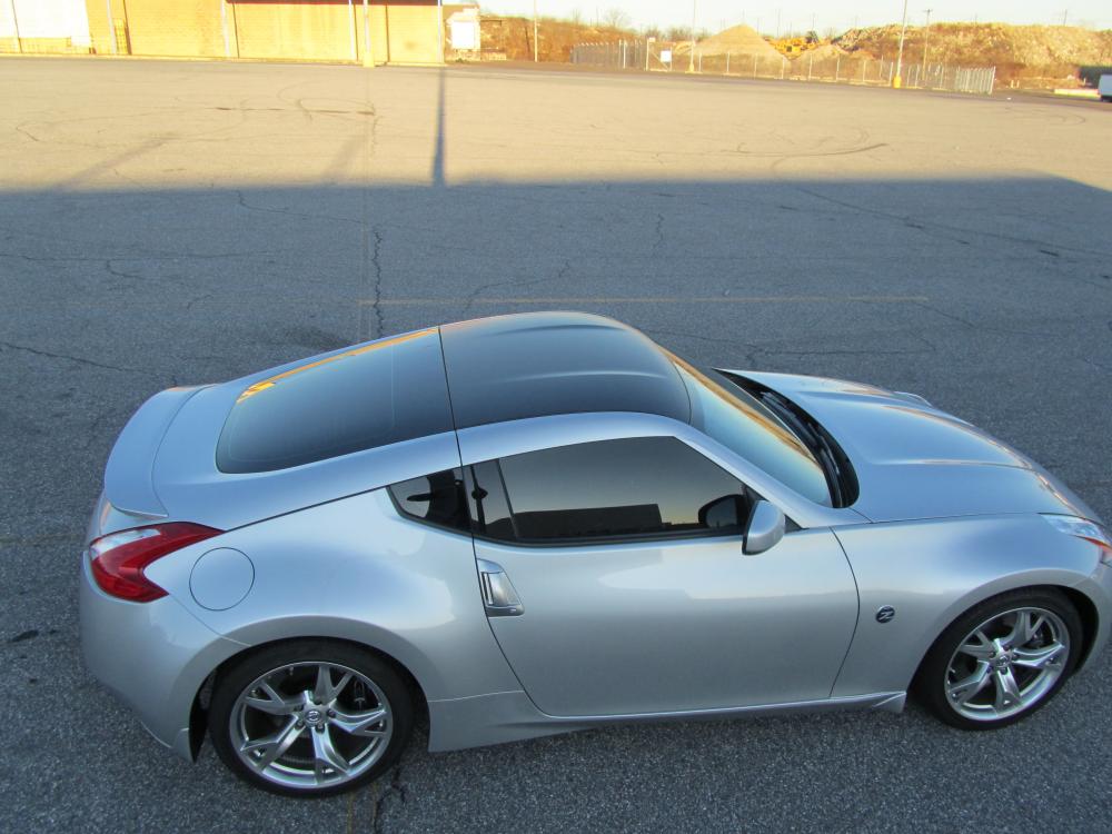 Matte black vinyl roof wrap, 15% tint all around