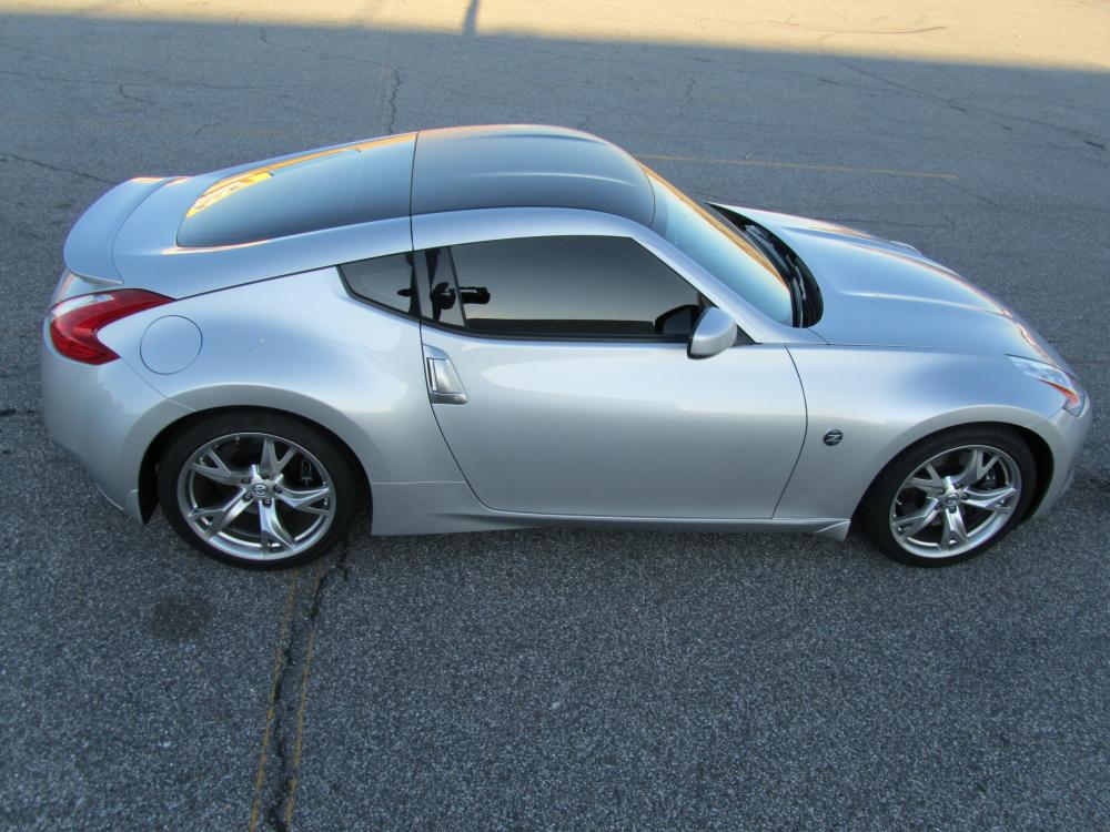 Matte black vinyl roof wrap, 15% tint all around