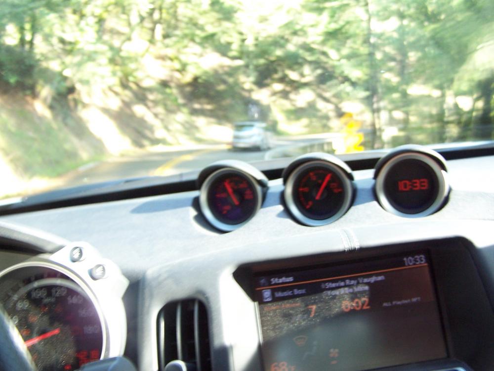 I am my own photgrapher. When first we met. A local high school kid, as evidenced by School decal, in his Mazda Speed3.