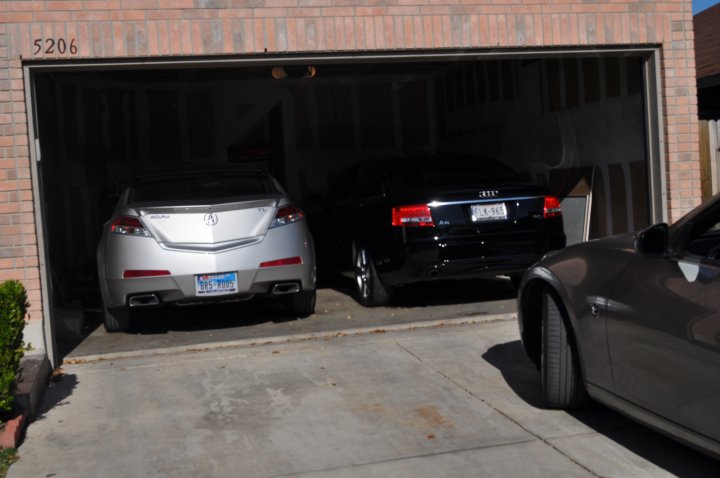 My moms Acura TL my pops Audi A6