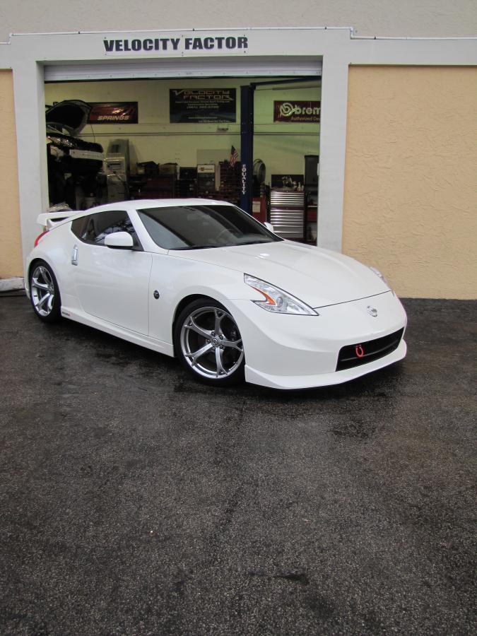 Z Lowered on H&R Sports Springs at Velocity Factor 
www.velocityfactor.org

I have a Facebook page dedicated to 370Z Nismo owners only. Just another way to say in touch with other 370 Nismo owners! If you are interested stop by and check it out!! 

http://www.facebook.com/groups/2321947