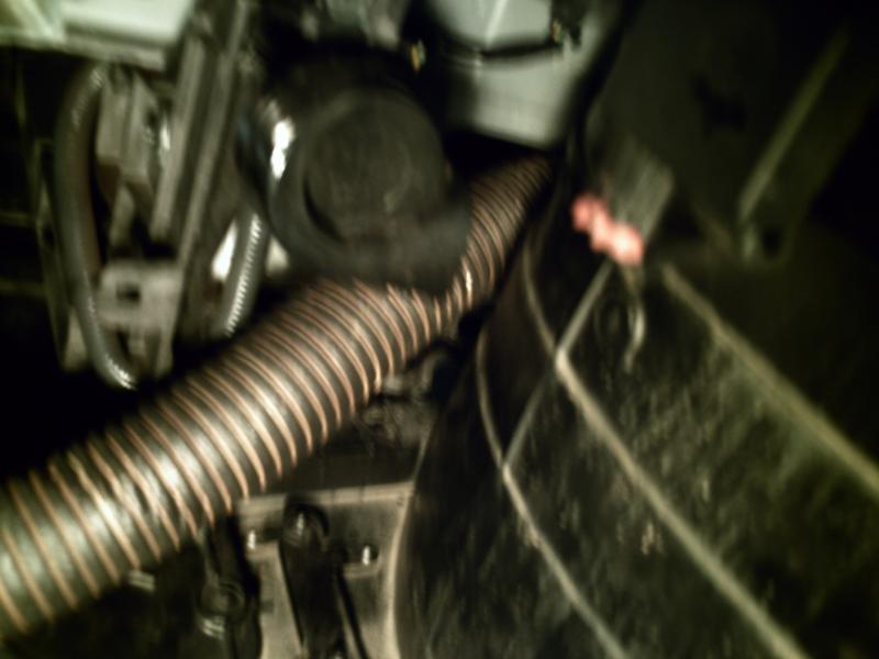 Driver tubing under horn