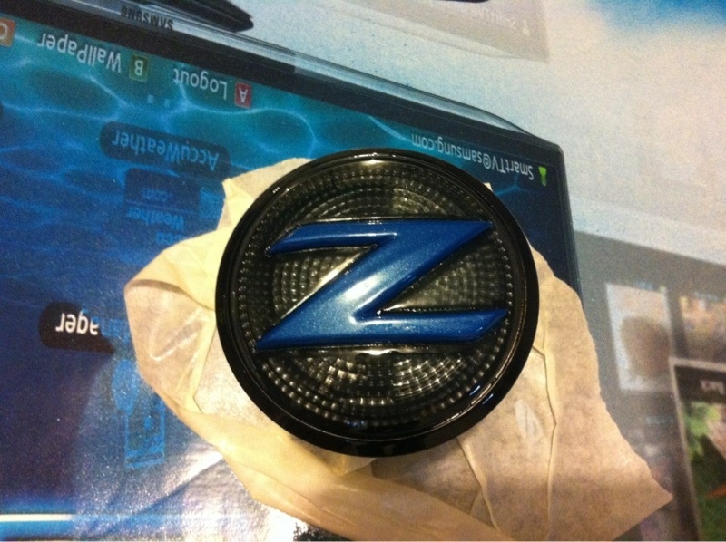 Outer ring black, Z body color blue, entire piece clear-coated.