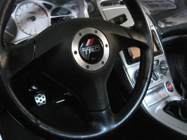 Old Conversion - Supra Authentic TRD Billet Red Stitch JDM Leather Steering Wheel Close Up