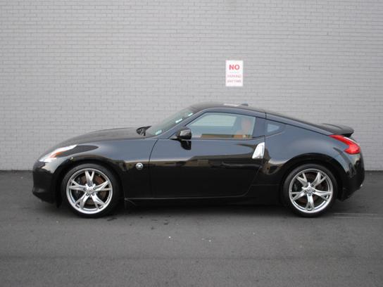 Parked Along the Side of the Porsche dealership that I purchased it from.