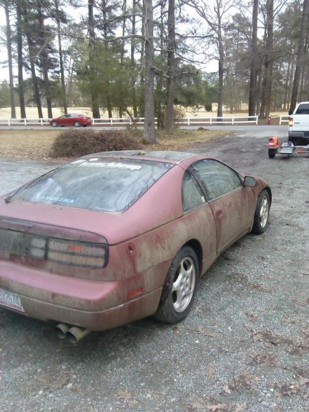 My first car being hauled off for parts after a blown head gasket and some major front end damadge.