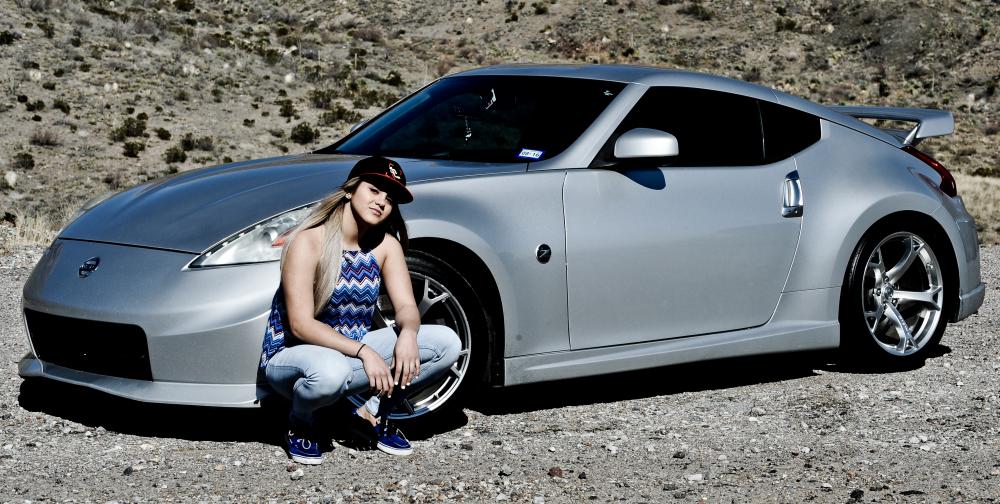 Ms. Breezy Aliyas on Transmountain HWY in El Paso with the 370z NISMO. Here she's wearing a Shutterjock cap. (Photo by G. A. Volb/Shutterjock)