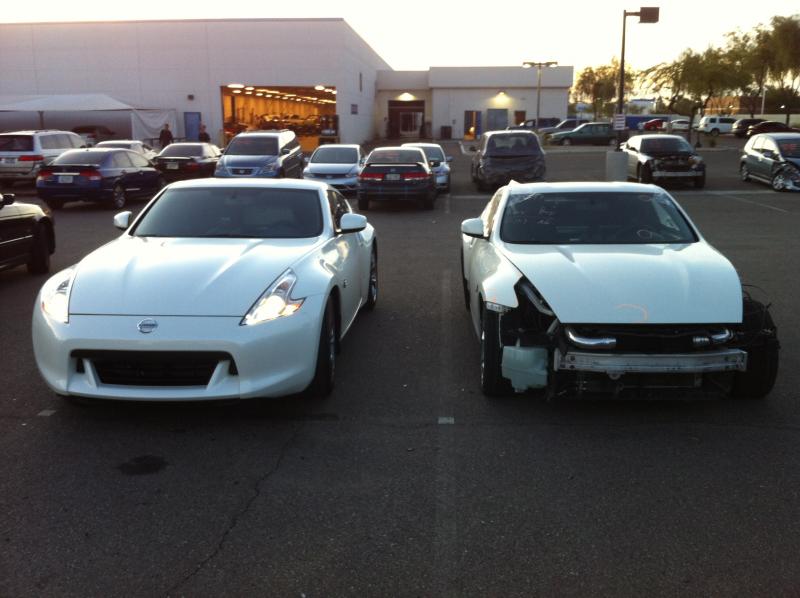 My totaled 2009 Z next to the new one - bone stock..