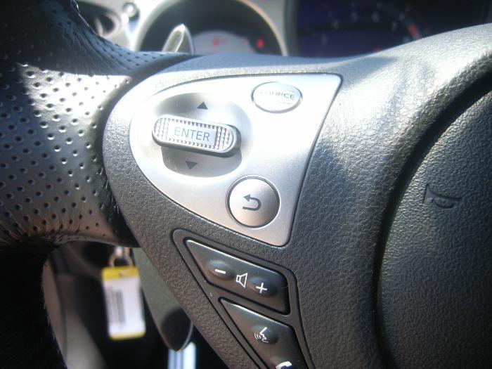 Left Side of Steering Wheel (Audio Controls)