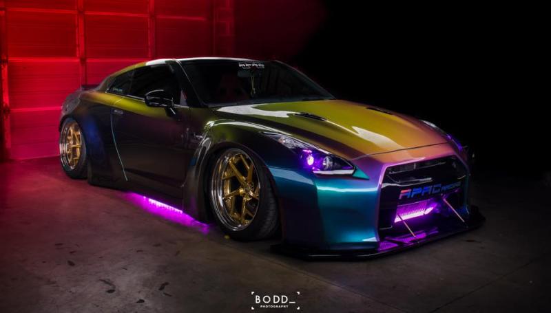 Fully body molded liberty walk GT-R painted in Shamrock Shimmer. APAC is the shop.