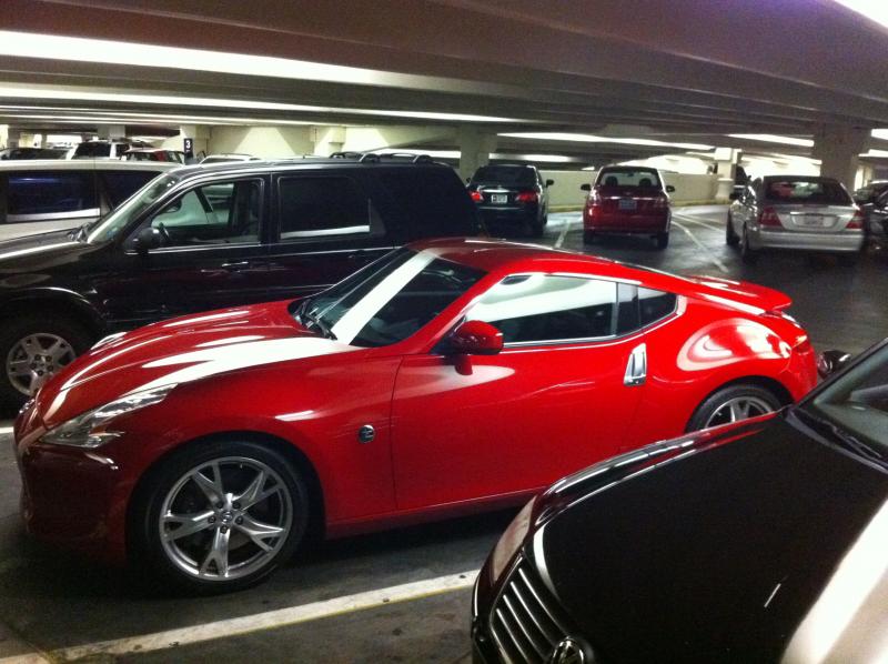 Parked under a light, it was gleaming in a parking garage, standing out from every other car.