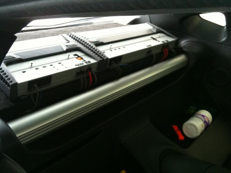 secondary view of amps. I'm not thrilled you can see those 1-2 inches of wires and plan to eventually relocate the amps to a custom fiberglass shelf between the seats and trunk area.