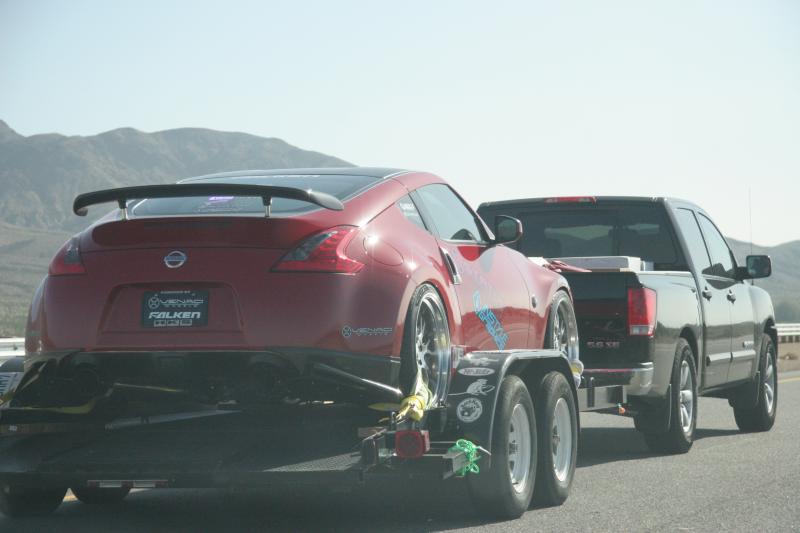 Nissan Titan bring Nissan 370Z to the track