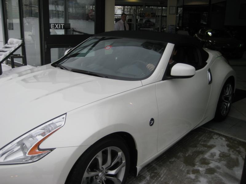 Driving the Z out of the showroom on buying day.