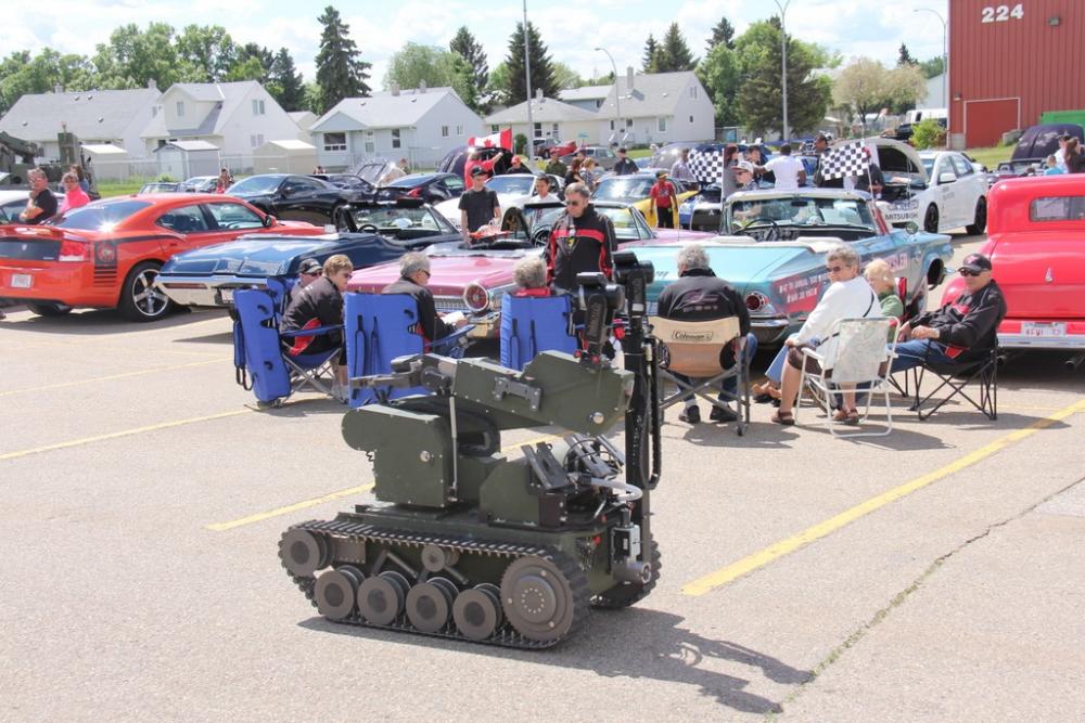 tEODor the Bomb Dispoal Robot rollin' thru the car show....