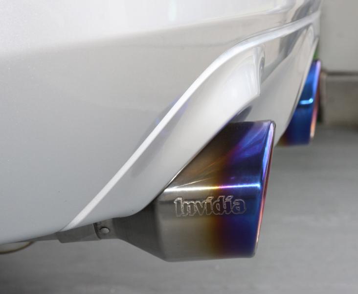 close up on Invidia Gemini Exhaust Titanium Rolled tips