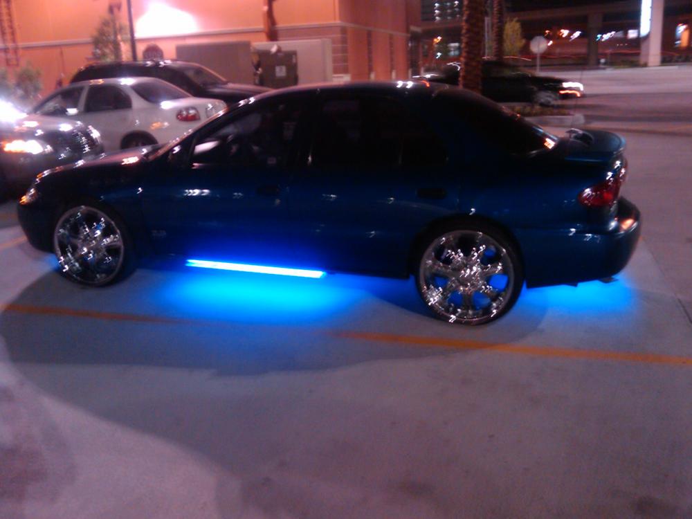 Ricer in our parking lot w/ neons.