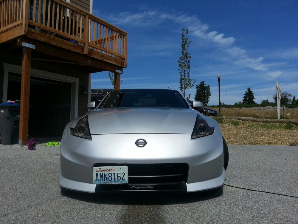 Tinted headlights, mower axel license platte bracket, vinyl lip.